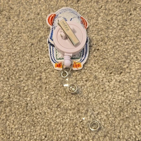 Penguin Badge Reel with Gift Design - Picture 2 of 2